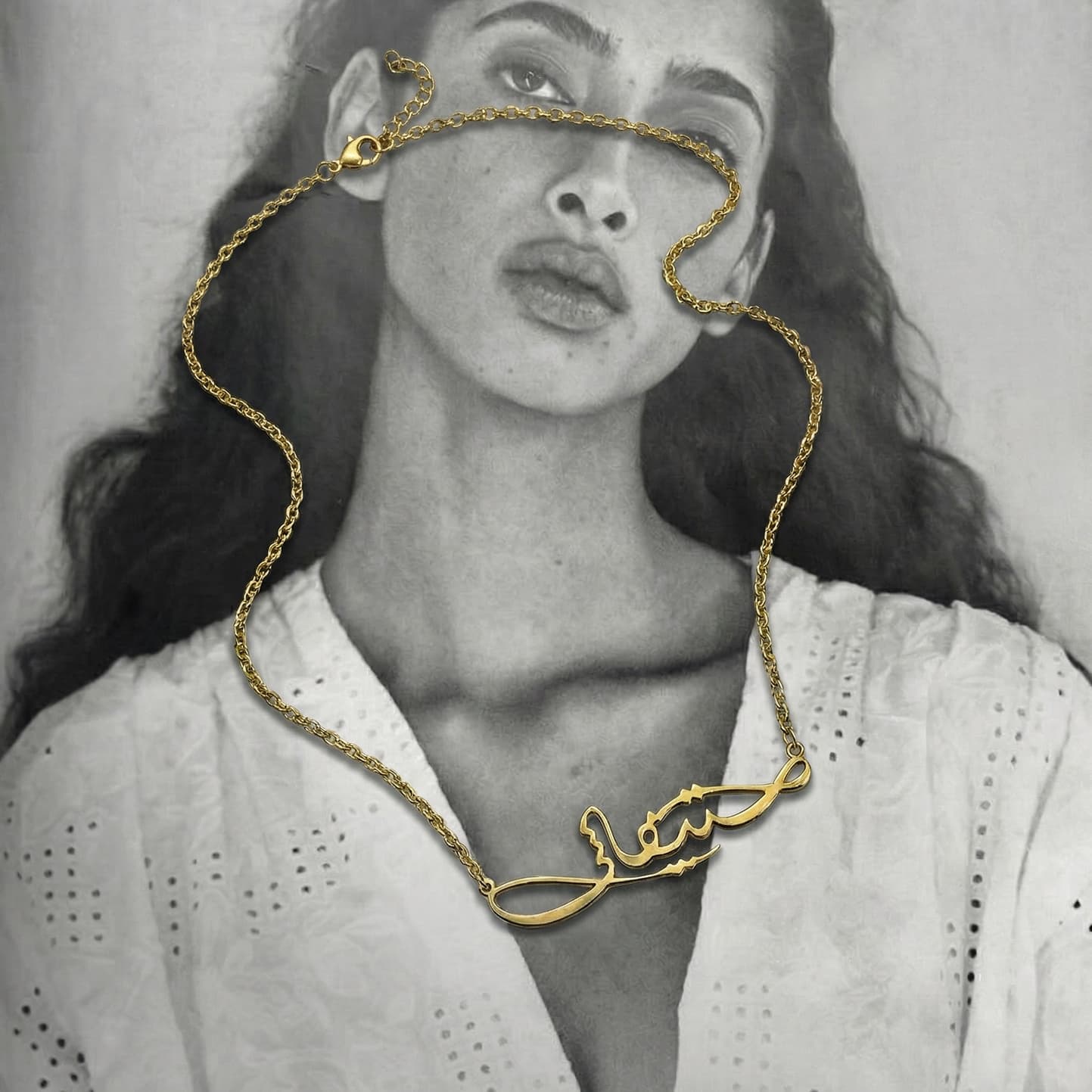 Editorial portrait of model wearing a Jourie necklace
