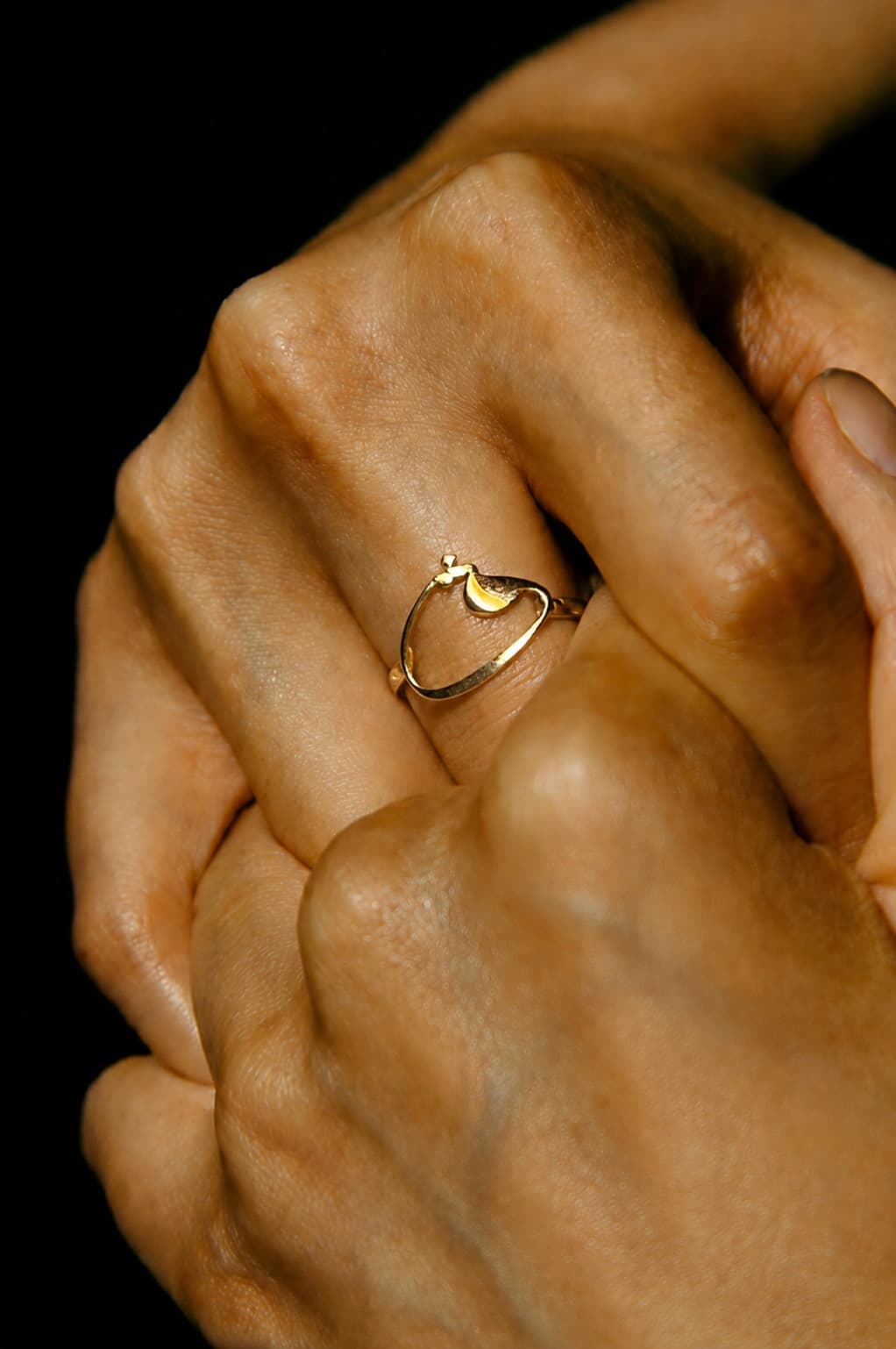 Hand wearing a Jourie ring