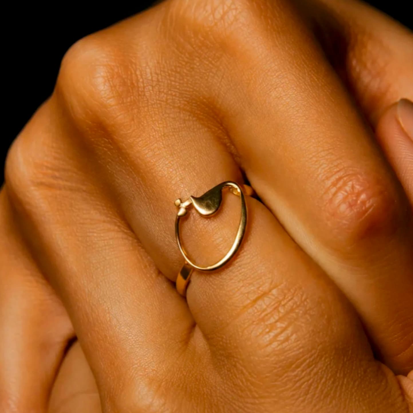 Hand wearing a Jourie ring